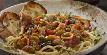 Photo de la recette : Recette de pâtes aux calamars à la tomate