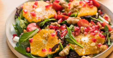 Photo de la recette : Recette salade végane aux agrumes, feuilles de laitue et grenade